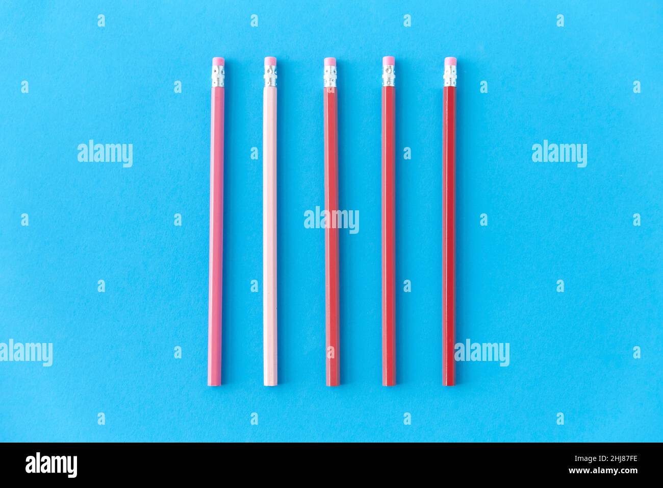 five lead pencils with eraser on tips Stock Photo