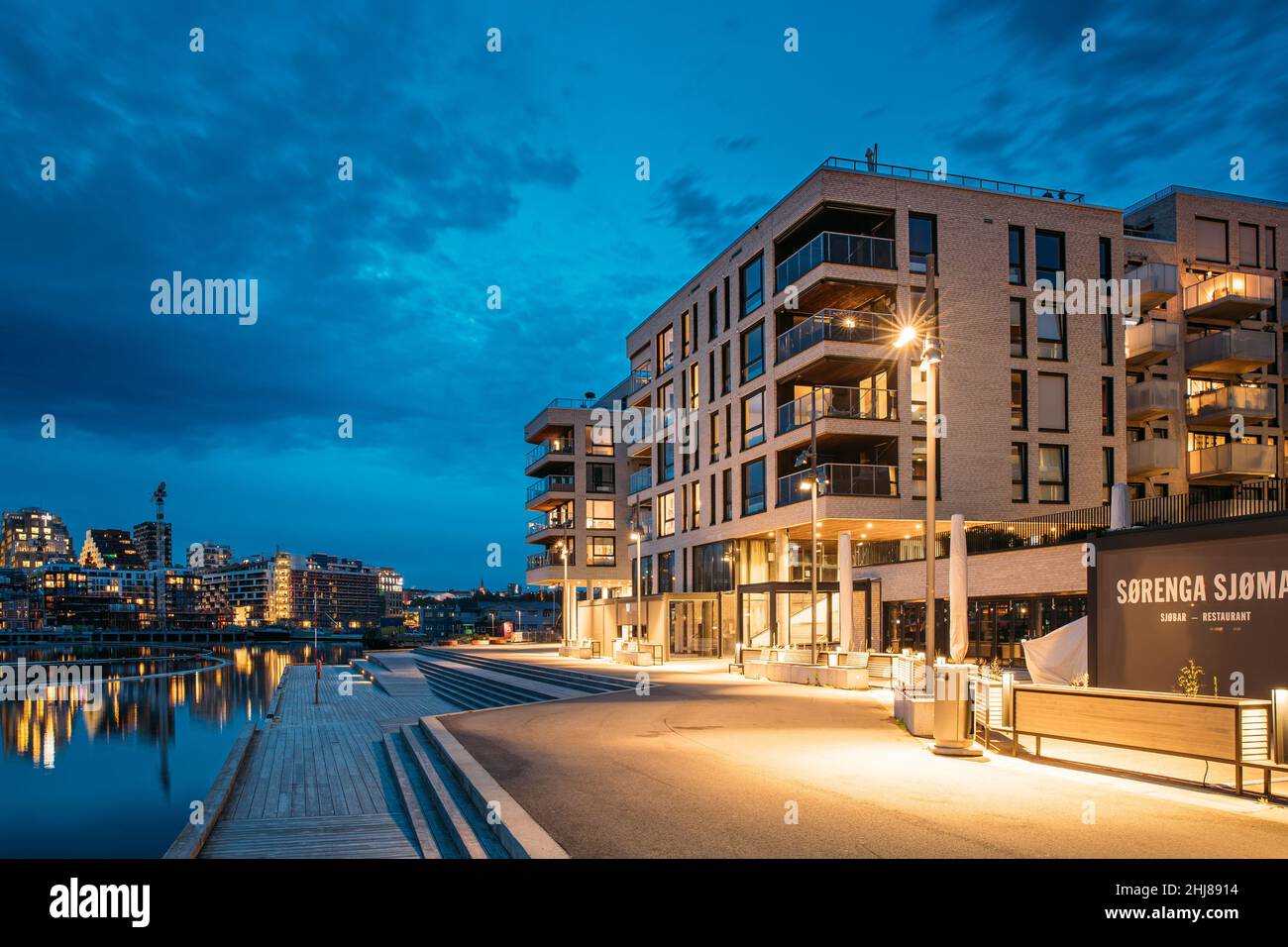 Oslo, Norway - June 25, 2019: Night View Embankment And Residential Multi-storey House On Sorengkaia Street In Gamle Oslo District. Residential Area Stock Photo