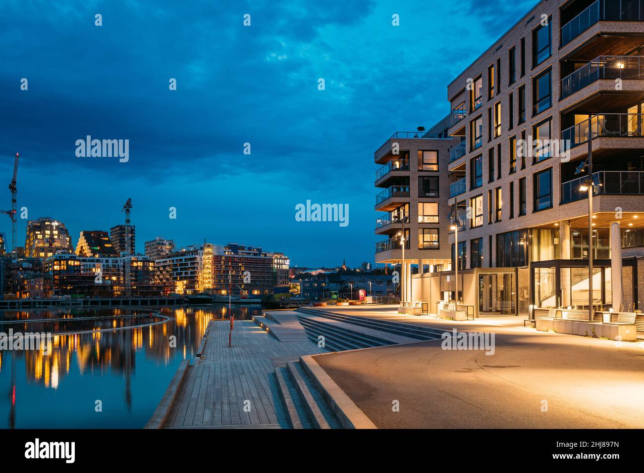 Oslo, Norway - June 25, 2019: Night View Embankment And Residential Multi-storey House On Sorengkaia Street In Gamle Oslo District. Residential Area Stock Photo