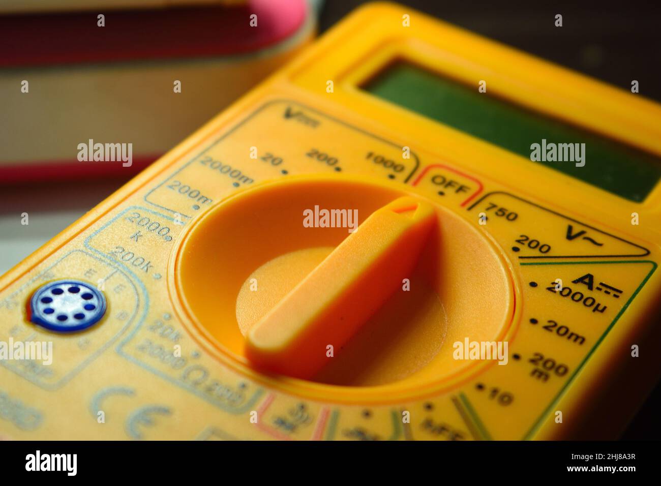 A small digital micrometer. A multimeter is an electronic measuring