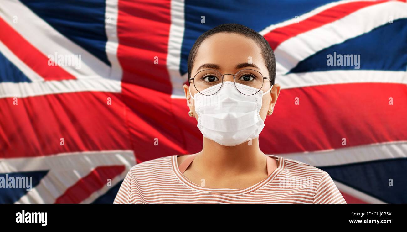 African woman in mask hi-res stock photography and images - Alamy