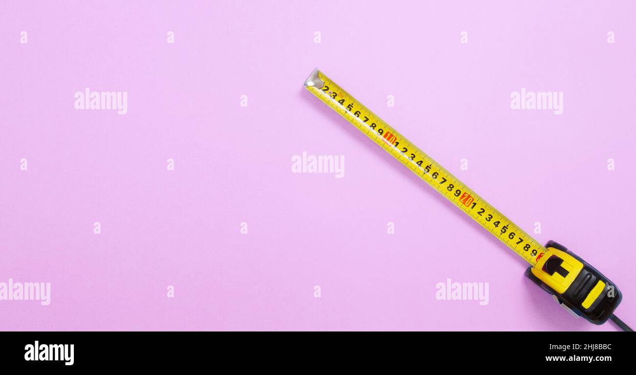 Measuring meter and sewing accessories on a white background
