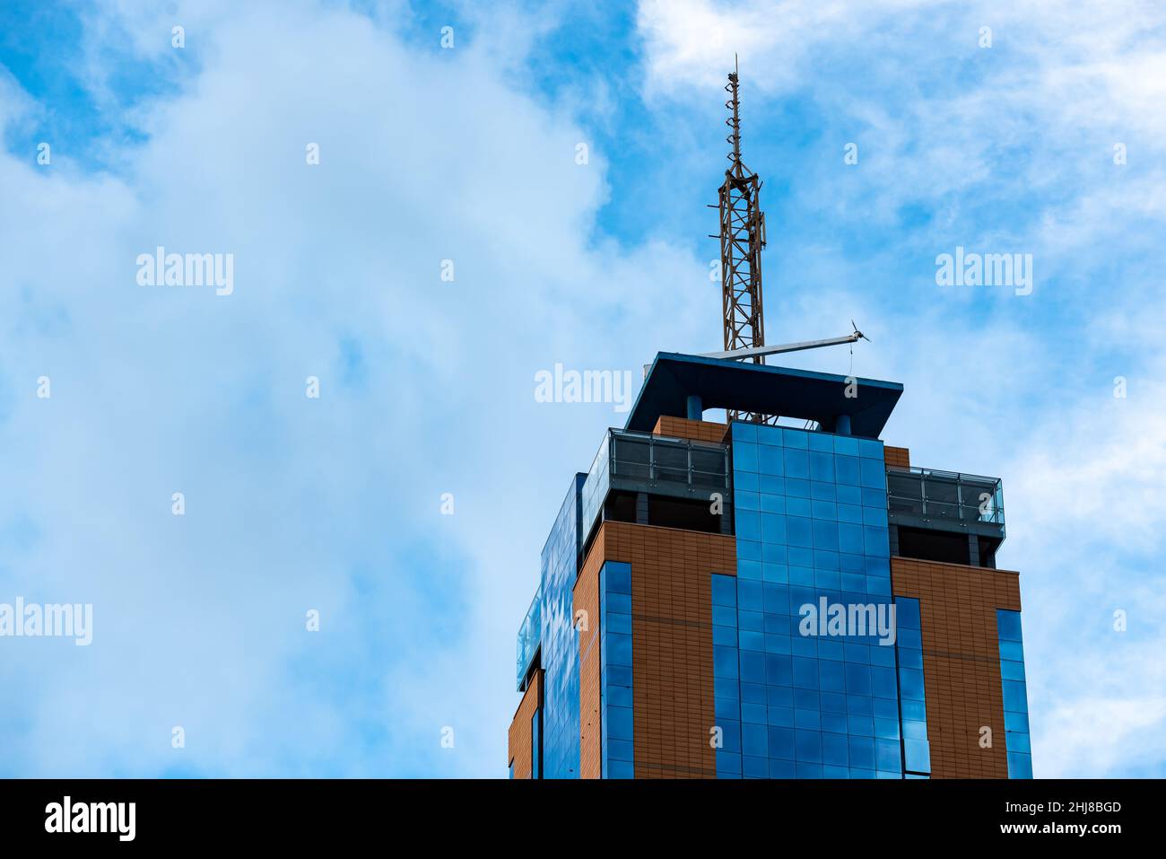 Saint Julian, Malta - 01 07 2022: Detail of the Portomaso business tower against a blue sky Stock Photo