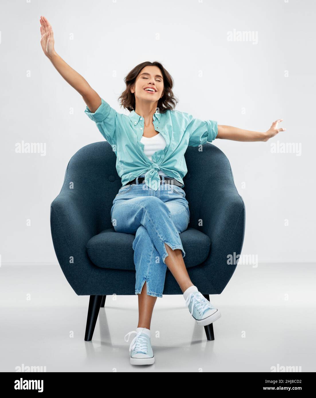 One woman sitting chair eyes closed hi-res stock photography and images ...
