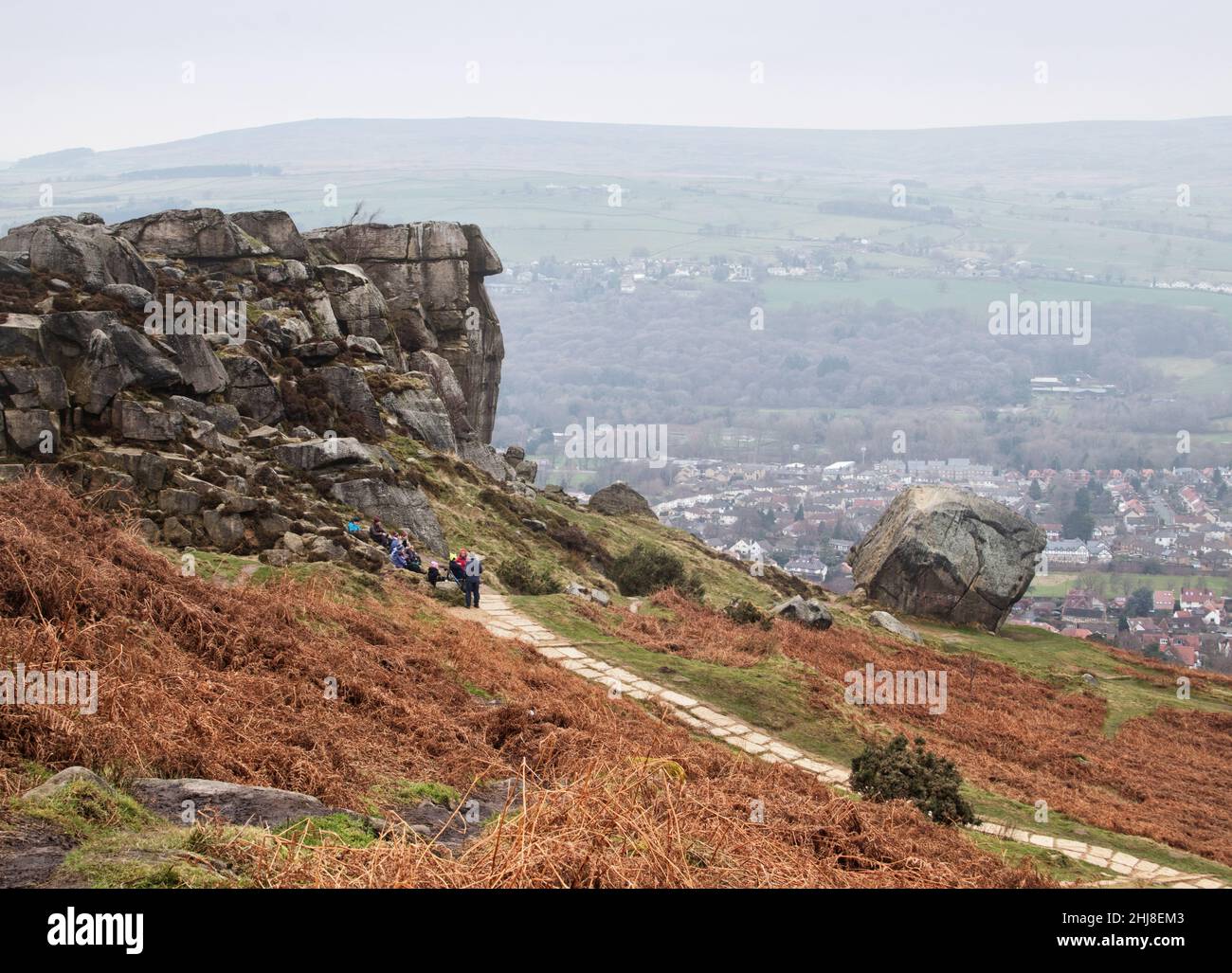 Looking over the town of Ilkley from the famous Cow and Calf rock formation Stock Photo
