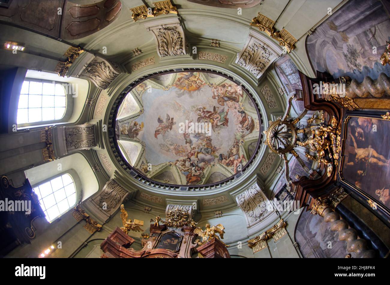 Interior of St Nicholas Church at Mala Strana (Kostel sv. Mikulase) in Prague, Czech Republic. Cathedral in old town. Famous landmark in the city. Stock Photo