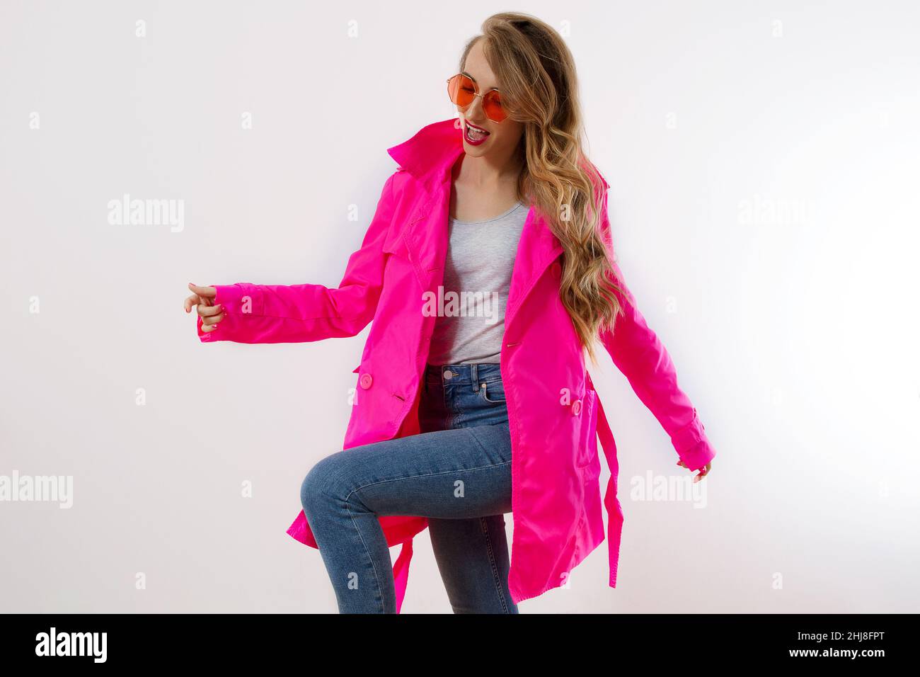 Girl with pink winter clothes hi-res stock photography and images