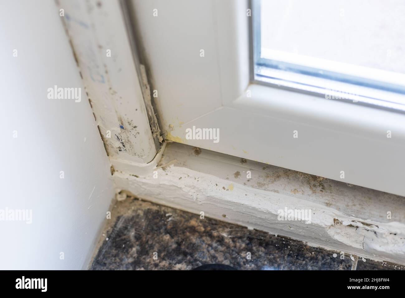 incorrectly installed plastic doors. hole in white plastic door Stock