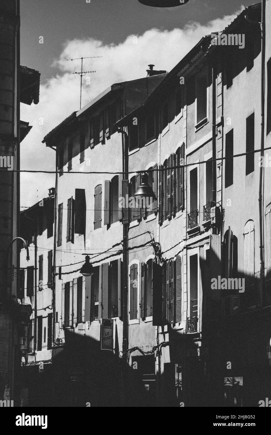 Grayscale vertical shot of a building facade Stock Photo - Alamy