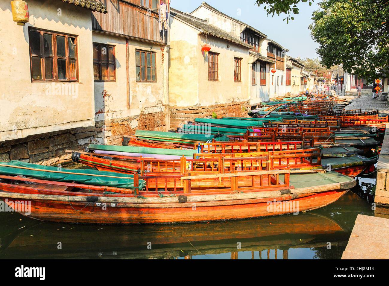 Water taxis waiting for clients on a canal in the water town of Zhouzhuang, China Stock Photo