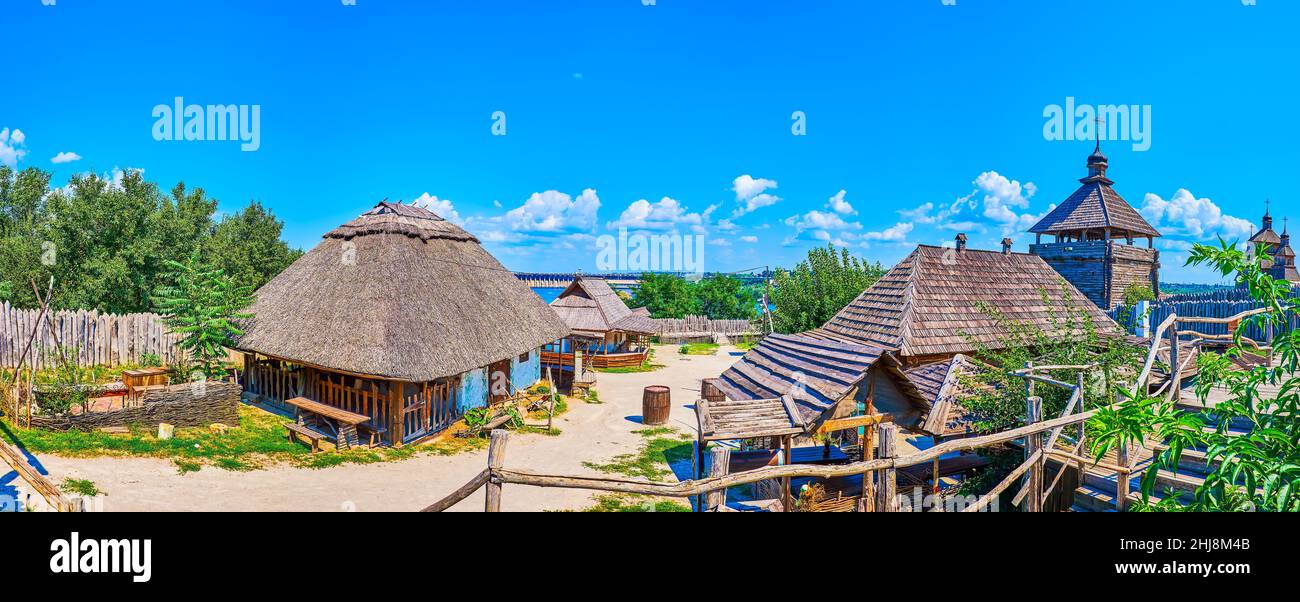 Panorama of the Small Kish (trade and craft settlement) of Zaporizhian Sich scansen with hata houses and shynok restaurant, located on Khortytsia Isla Stock Photo