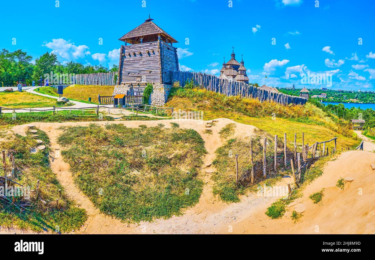 The wooden fort of Zaporizhian Sich Fort scansen with tall stakewall (palisade), towers, St Nicholas Church and dug moat, Khortytsia Island, Zaporizhz Stock Photo