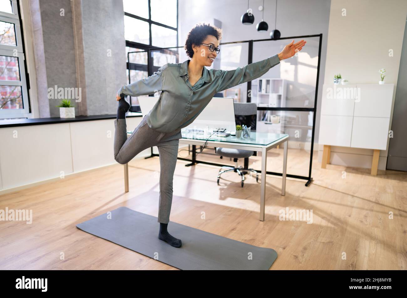 Yoga Office Workout And Gymnastics At Computer Business Desk Stock