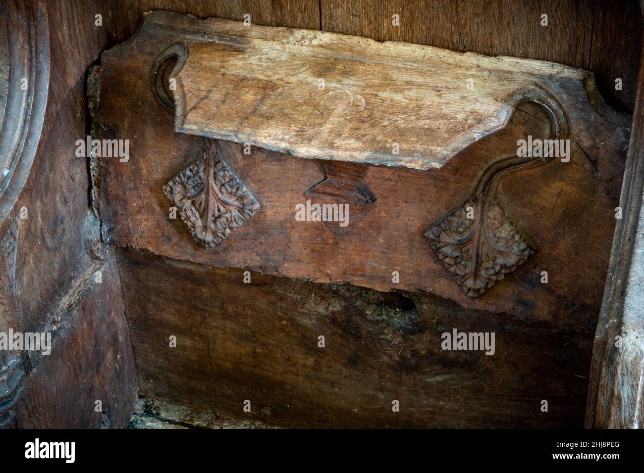 Misericord in the upright position at St Lawrence Church Brundish, Suffolk, UK Stock Photo