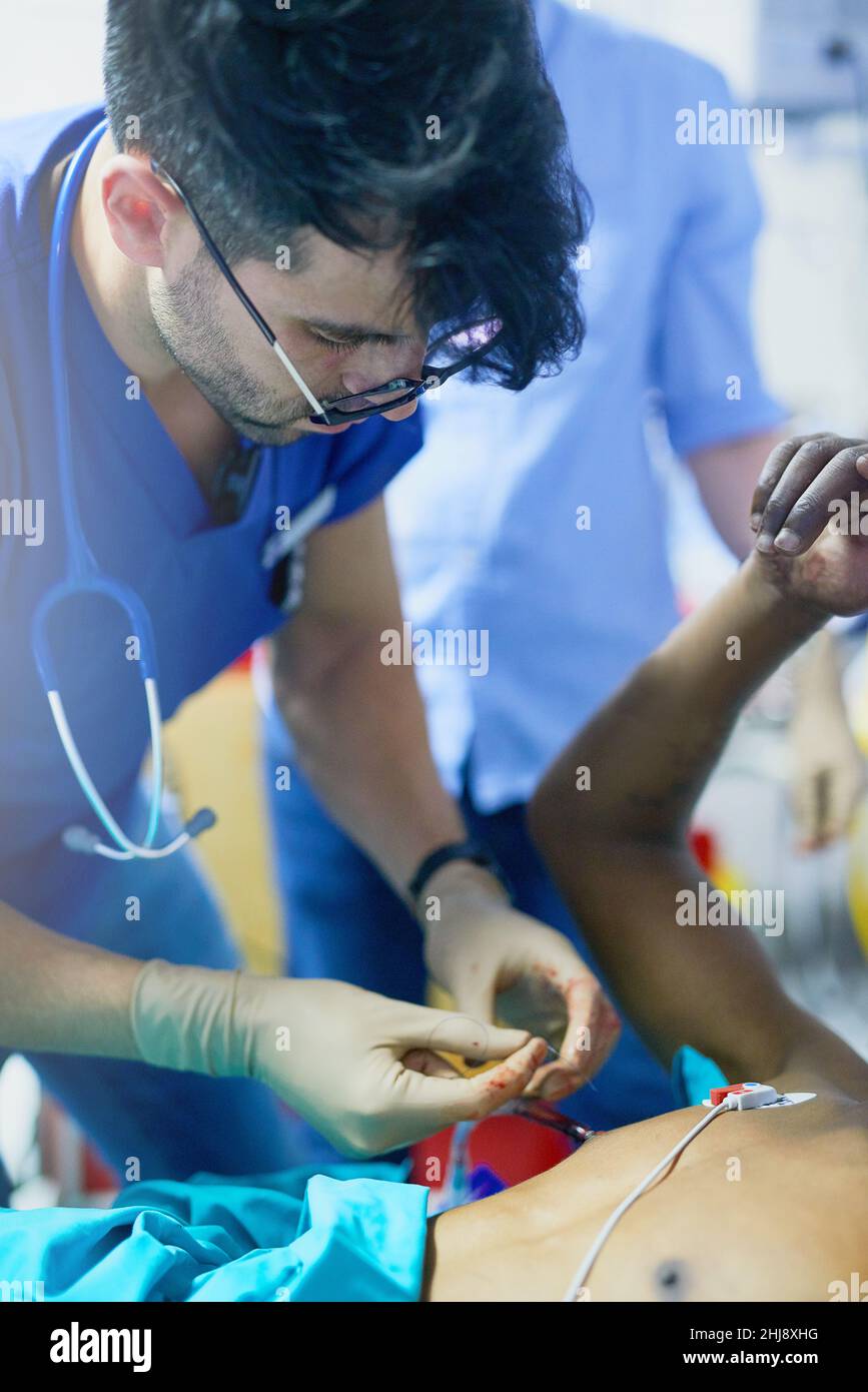 Focus is a critical skill required in trauma Stock Photo