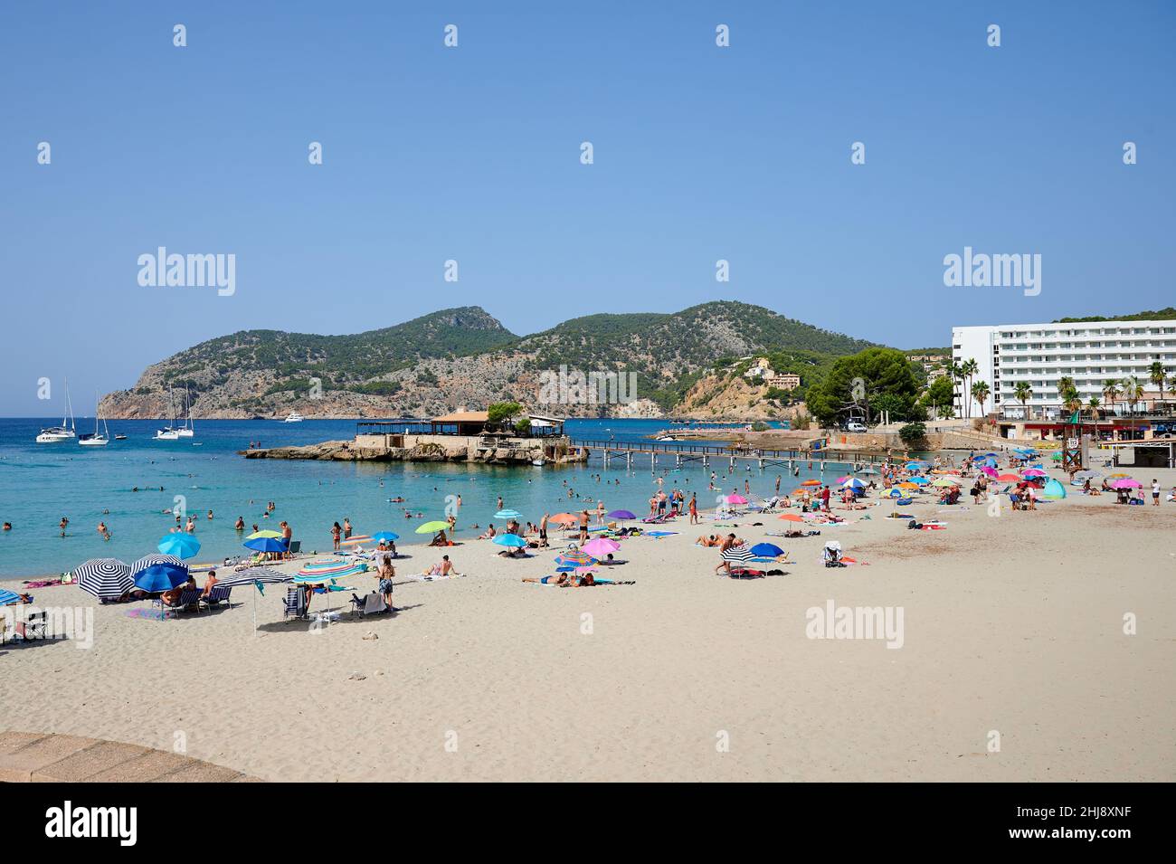 beach with sunbathing people in Camp de Mar, Mallorca, Spain Stock