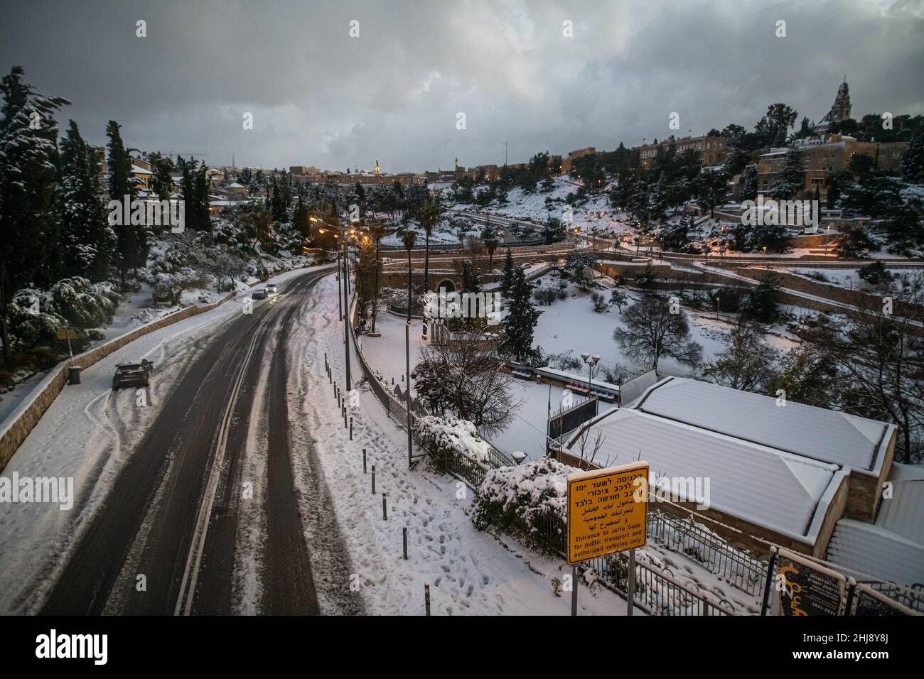 A view towards snowy Jerusalem Old City and Gey Ben Hinnom Park. Jerusalem, Israel. Jan 27th 2022. (Photo by Matan Golan/Sipa USA) Stock Photo