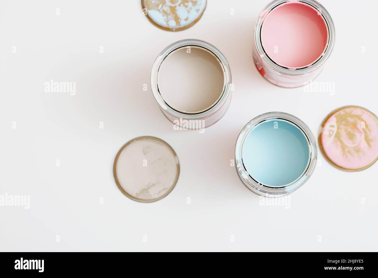 Top view of open paint tin cans on white background Stock Photo Alamy