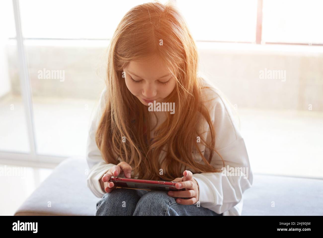 Young Girl Use Phone during School Break. Girl Play Online Games Stock  Image - Image of cute, game: 151348601