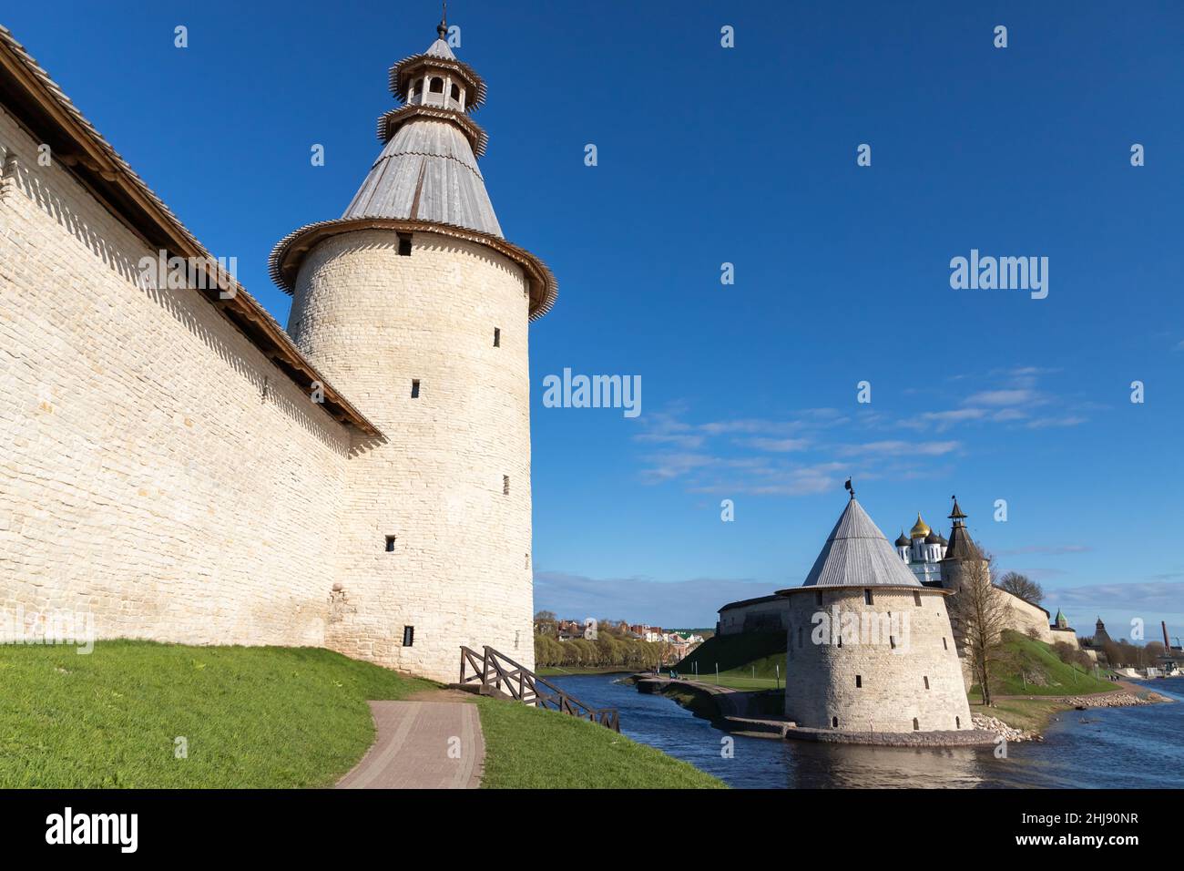 Stone towers and walls of the Kremlin of Pskov, Russian Federation. Ancient coastal fortification Stock Photo