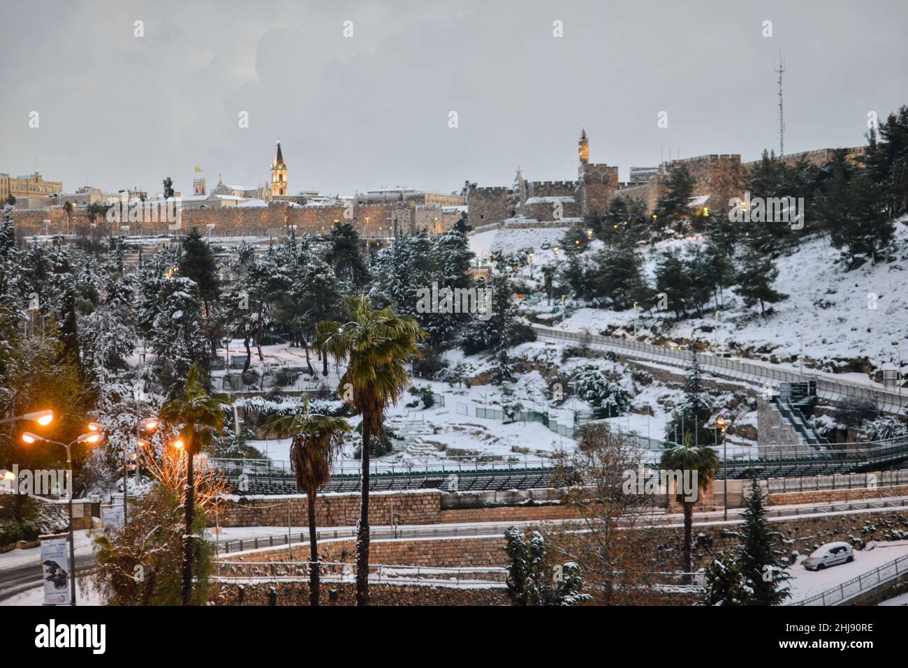 A view towards snowy Jerusalem Old City and Gey Ben Hinnom Park. Jerusalem, Israel. Jan 27th 2022. ( Credit: Matan Golan/Alamy Live News Stock Photo