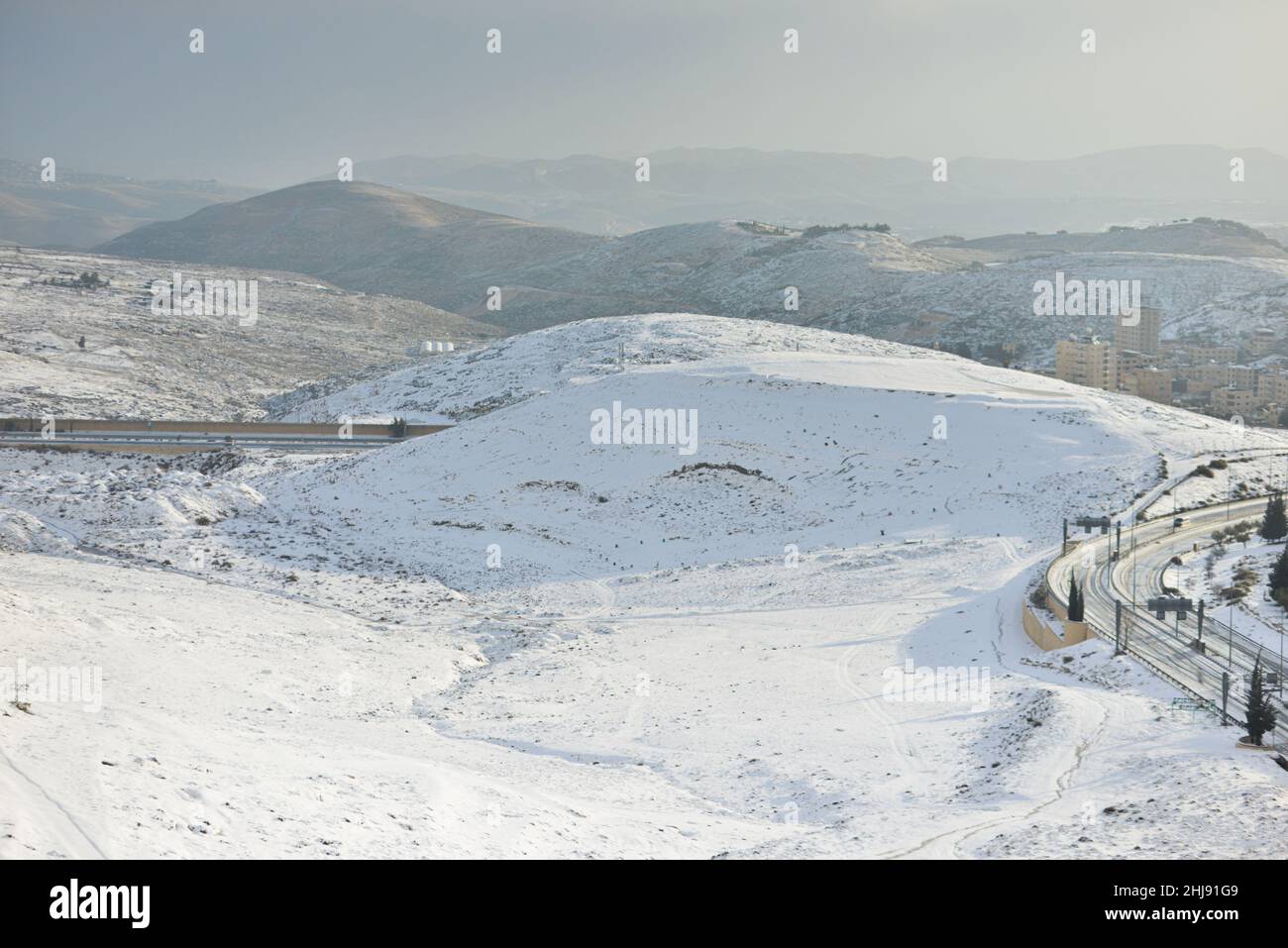 A view from snowy Mount Scopus towards the Judaean Desert. Jerusalem, Israel. Jan 27th 2022. ( Credit: Matan Golan/Alamy Live News Stock Photo