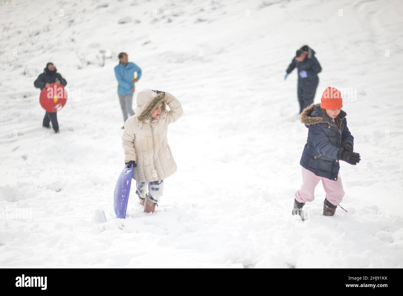 Israeli and Palestinian Families play in the snow on Mount Scopus. Jerusalem, Israel. Jan 27th 2022. ( Credit: Matan Golan/Alamy Live News Stock Photo