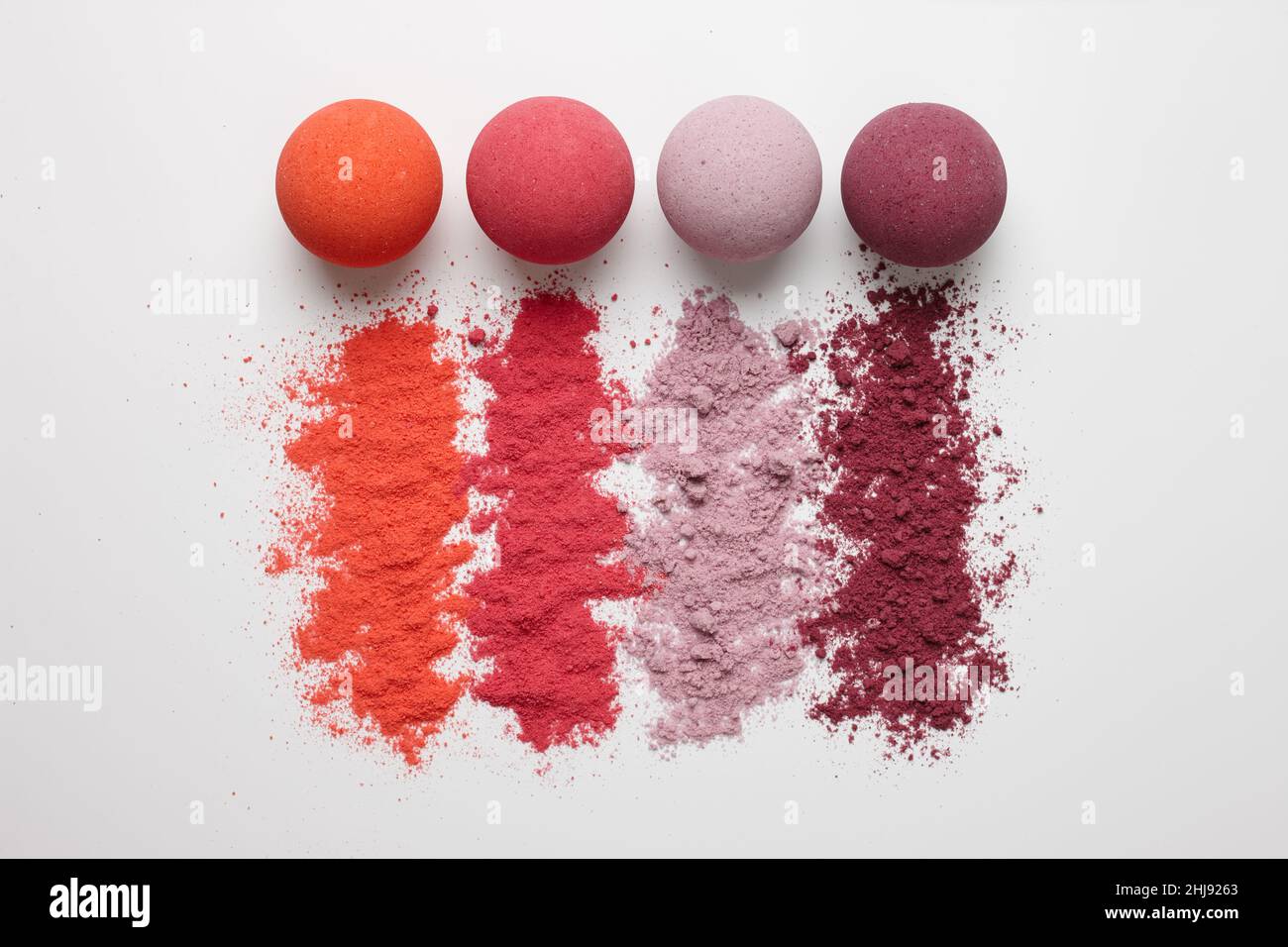 Set of multicolored bath bombs on a white background Stock Photo