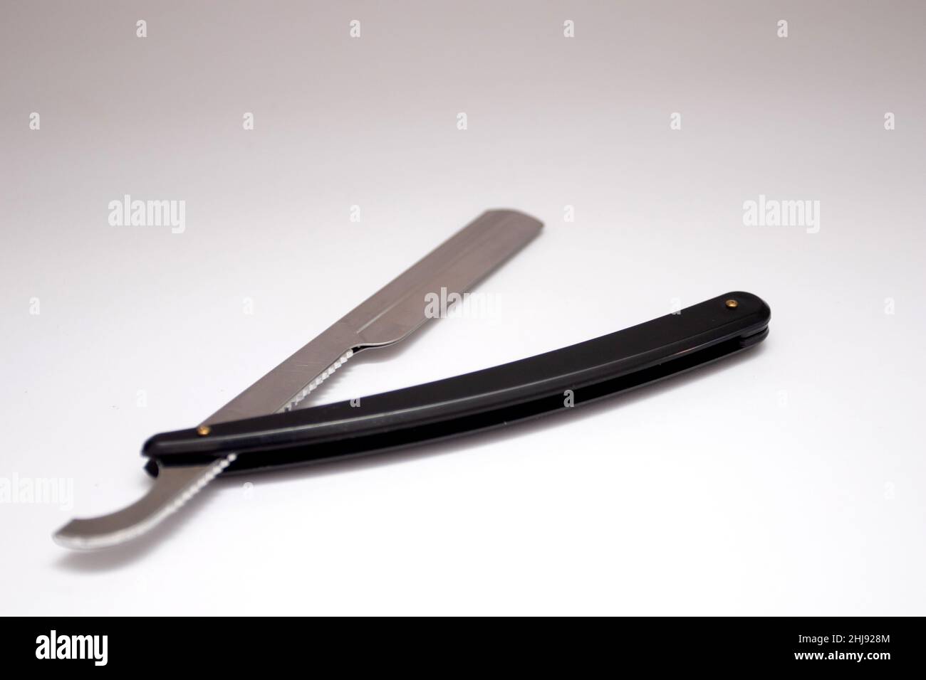 Black straight dangerous razor on a white background Stock Photo Alamy