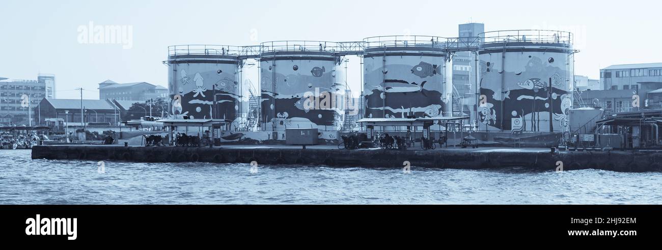 Monochromatic representation of the flat bottom tank farm in the Kaohsiung Harbour in Taiwan Stock Photo