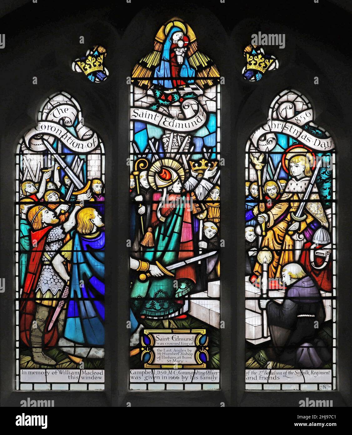 A stained glass window by John Lawson, depicting The Crowning of King Edmund of East Anglia, St Edmund's Church, Hunstanton, Norfolk Stock Photo