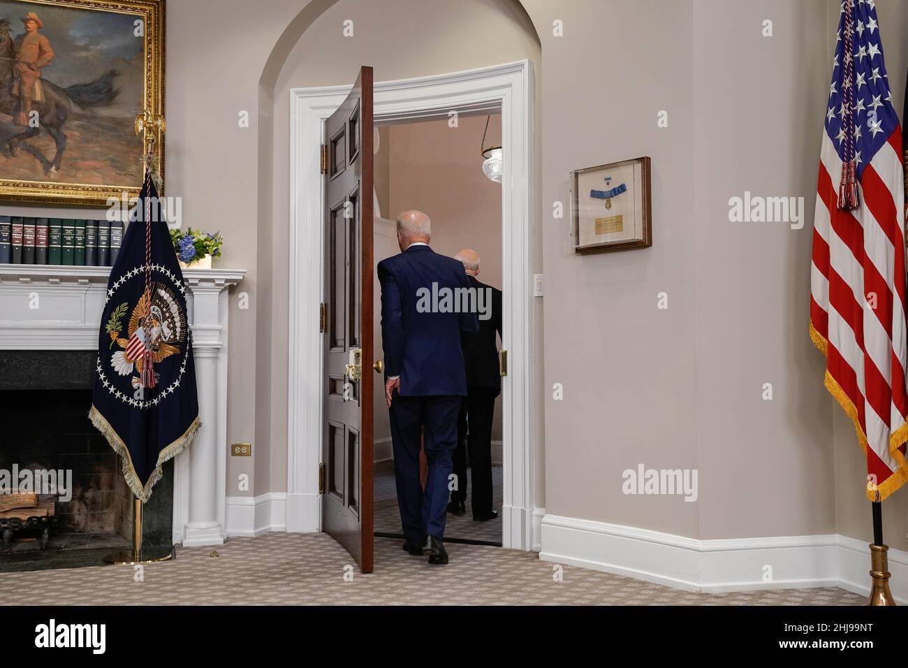 United States President Joe Biden leaves the Roosevelt Room at the White House in Washington on January 27, 2022. Credit: Yuri Gripas/Pool via CNP /MediaPunch Stock Photo
