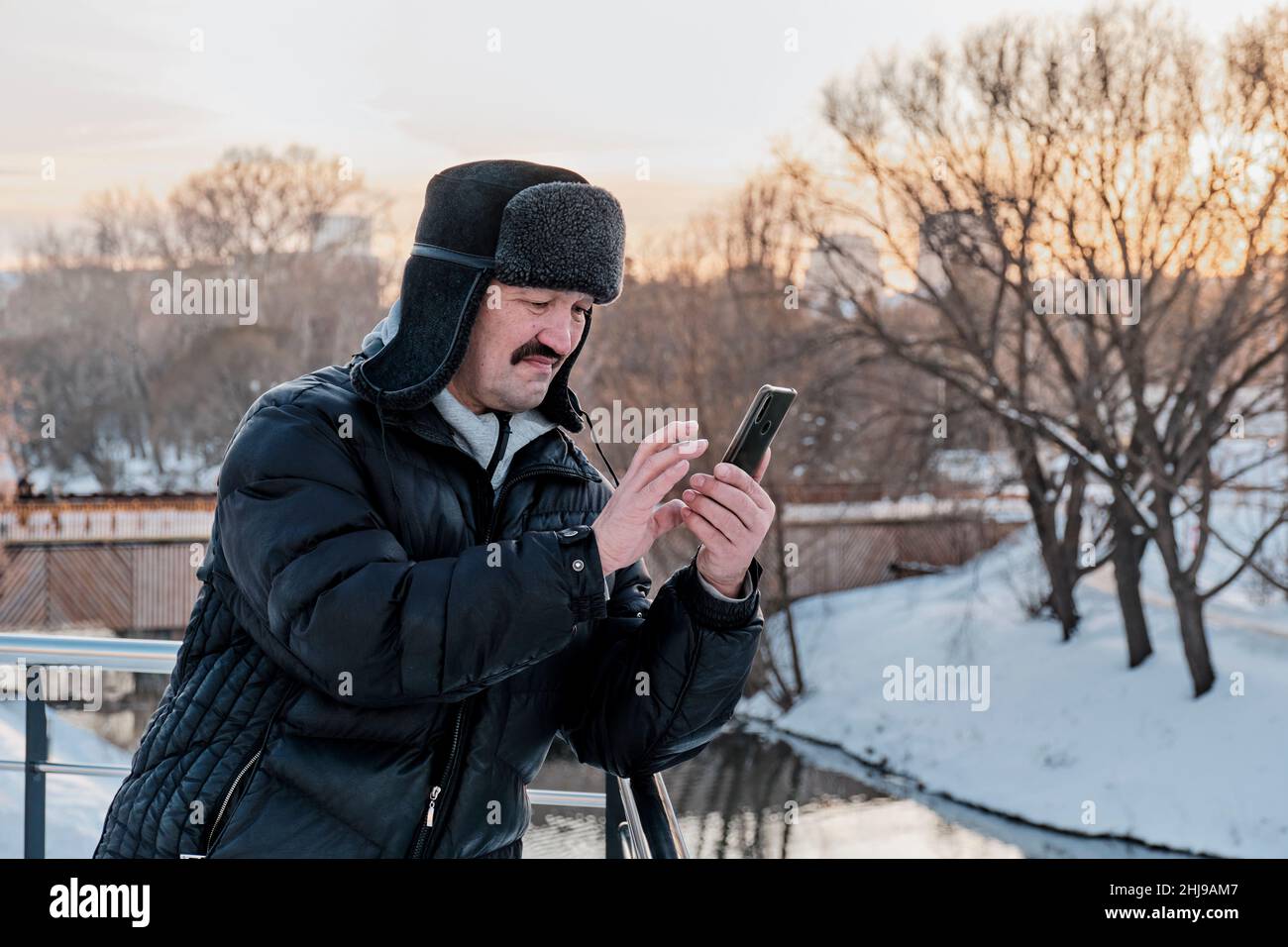 Asian man wearing winter jacket hi-res stock photography and images - Alamy