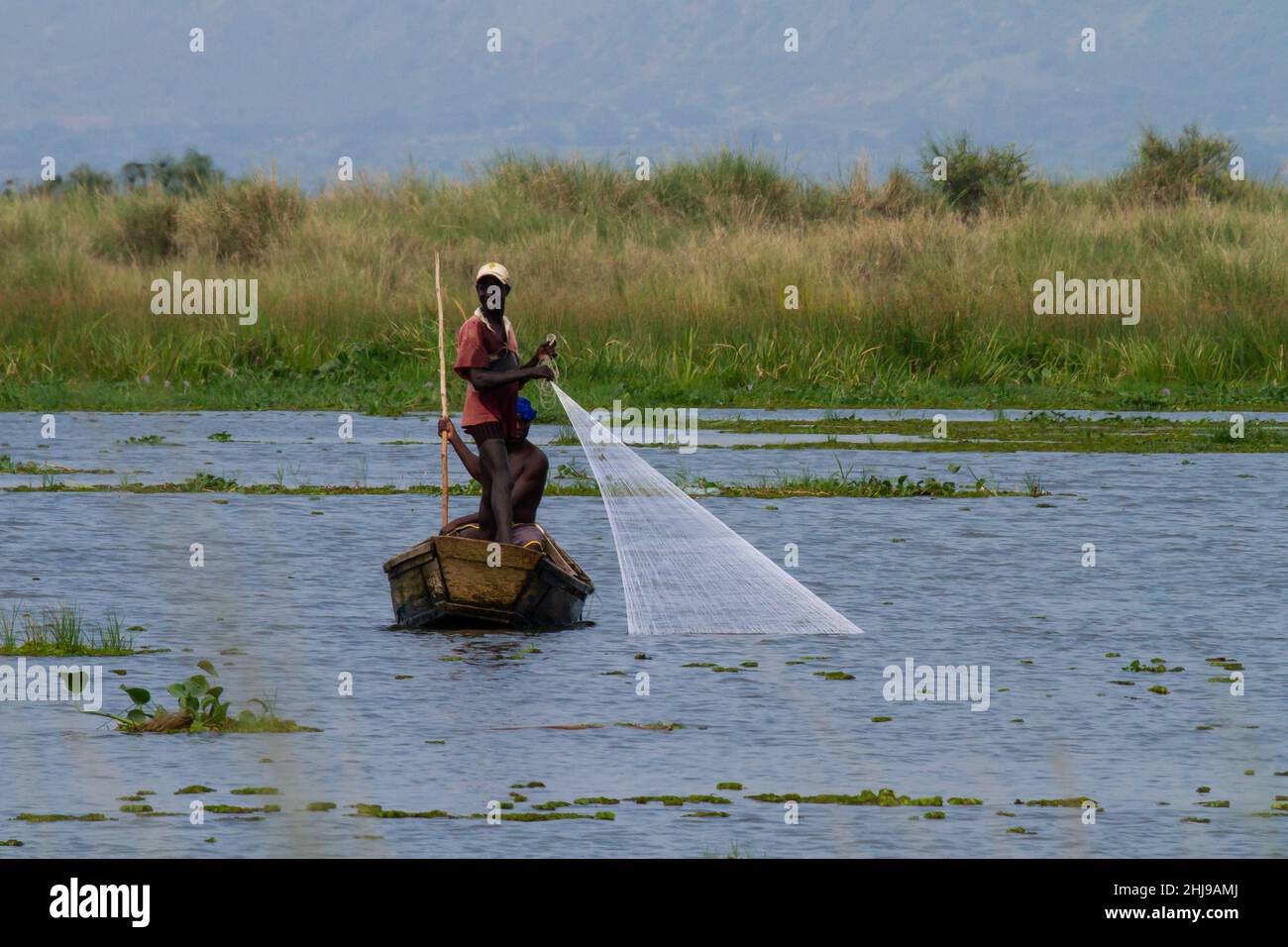 Fisherman throwing net hi-res stock photography and images - Page 4 - Alamy