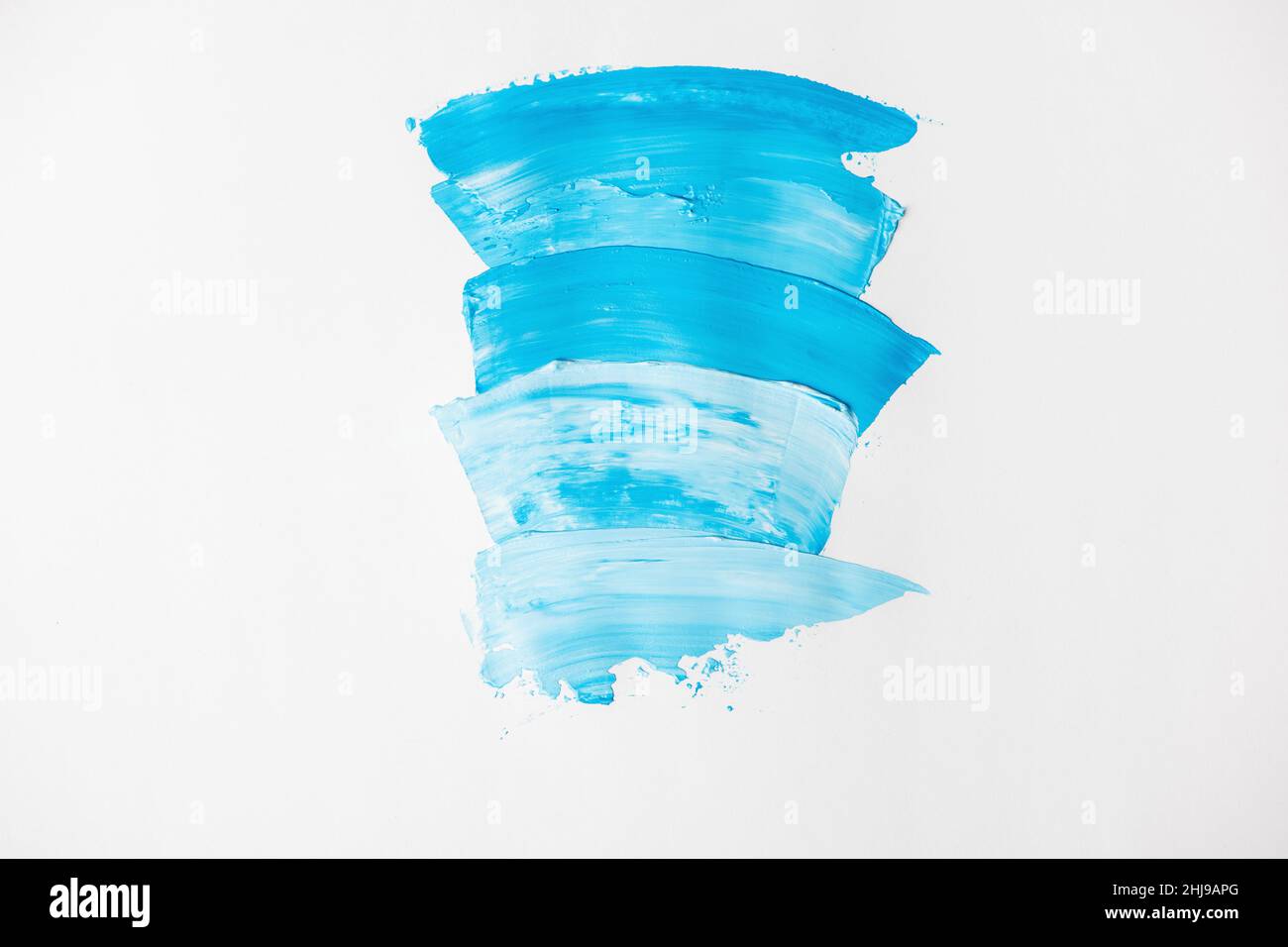 Strokes of blue watercolor paint brush on white background Stock Photo ...