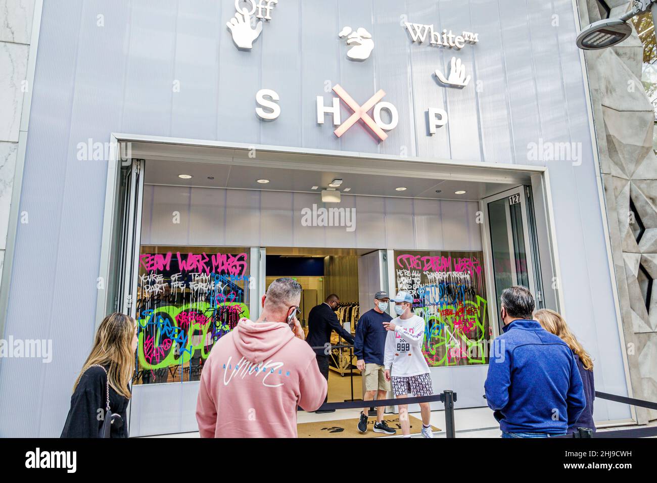 Miami Florida Design District shopping shoppers Off-White designer Virgil  Abloh clothing outside exterior entrance store customers line queue waiting  Stock Photo - Alamy