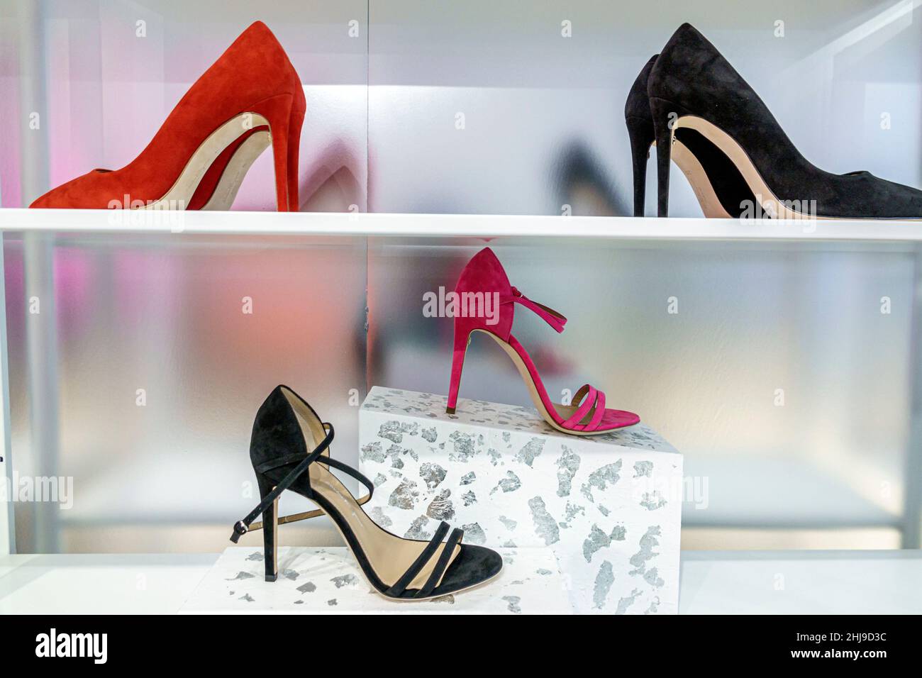 Miami Florida Design District shopping Salvatore Ferragamo Italian luxury fashion designer inside interior display sale store high heel shoes Stock Photo