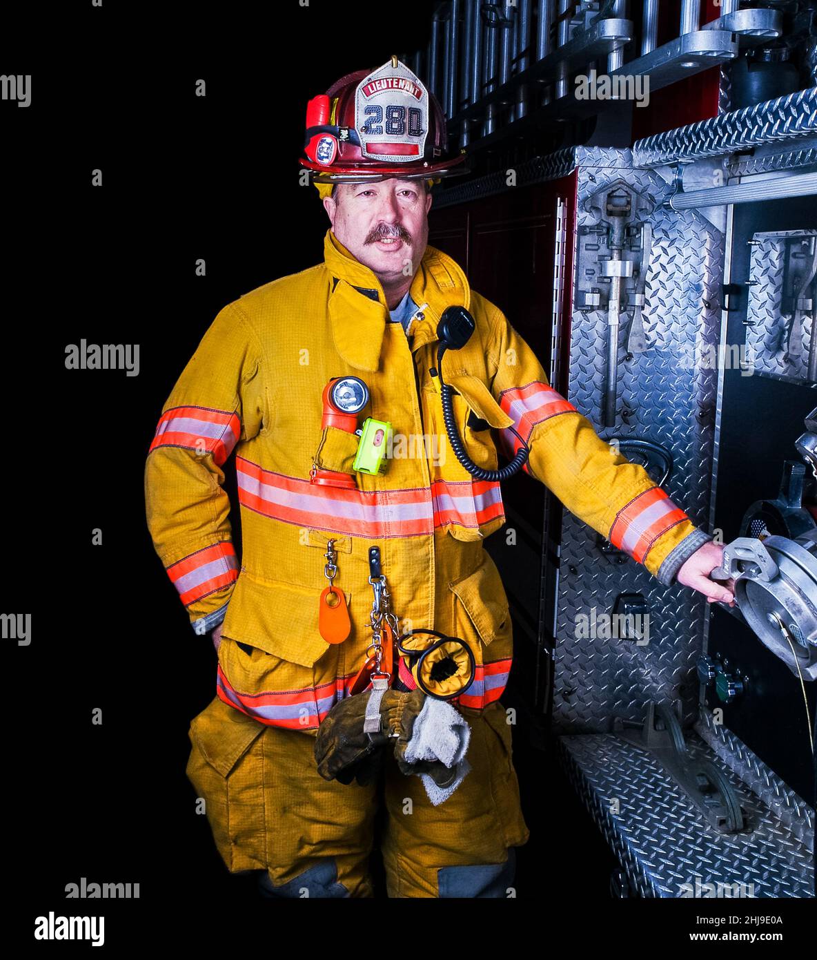 Firefighter in turnout gear Stock Photo - Alamy