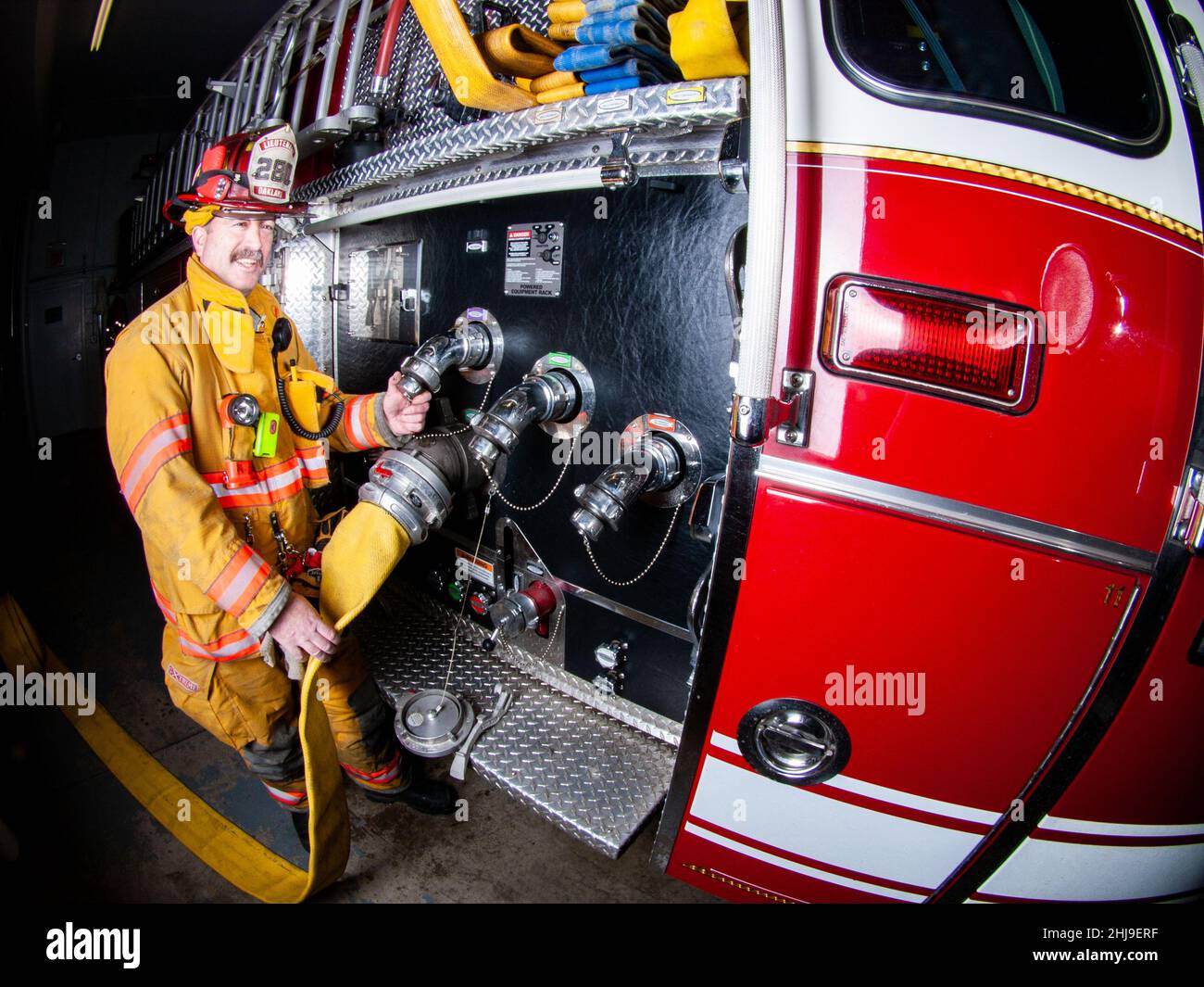Firefighter in turnout gear Stock Photo - Alamy