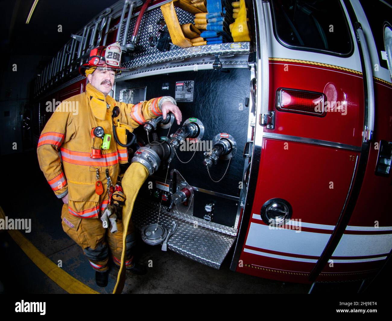 Firefighter in turnout gear Stock Photo - Alamy