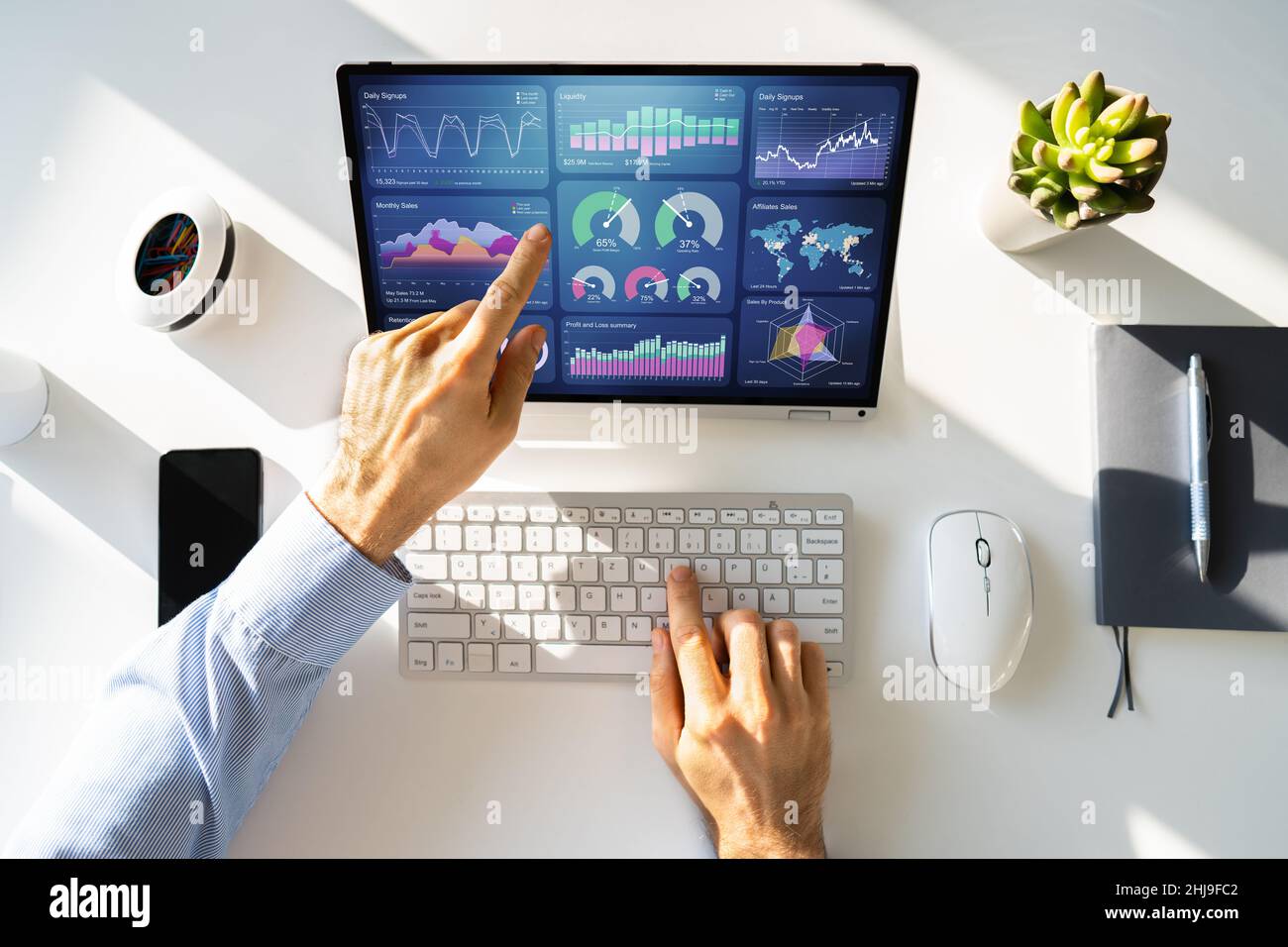 Data Analyst Using Data Analytics KPI Dashboard Stock Photo