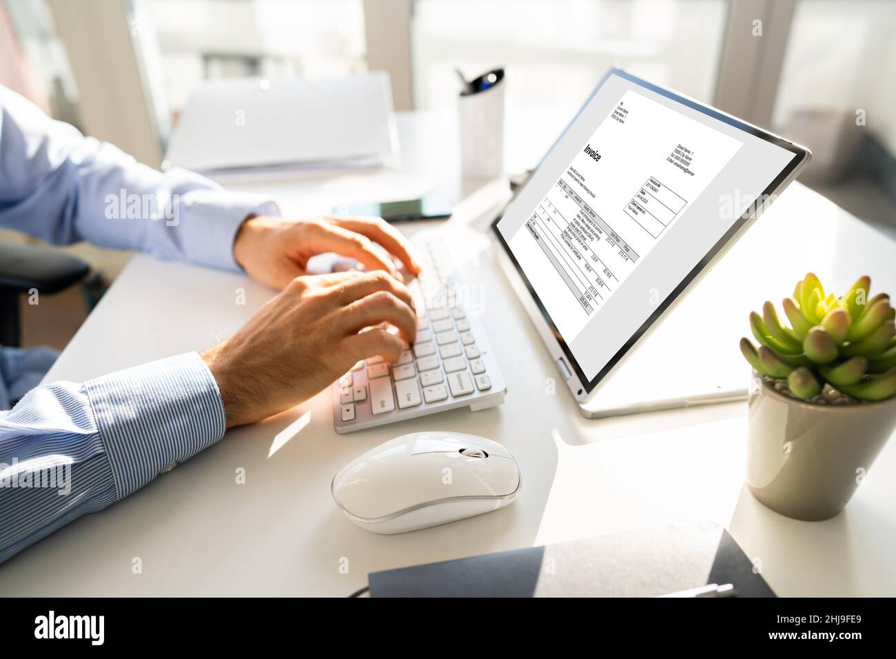 Online Digital E Invoice Statement On Laptop Stock Photo