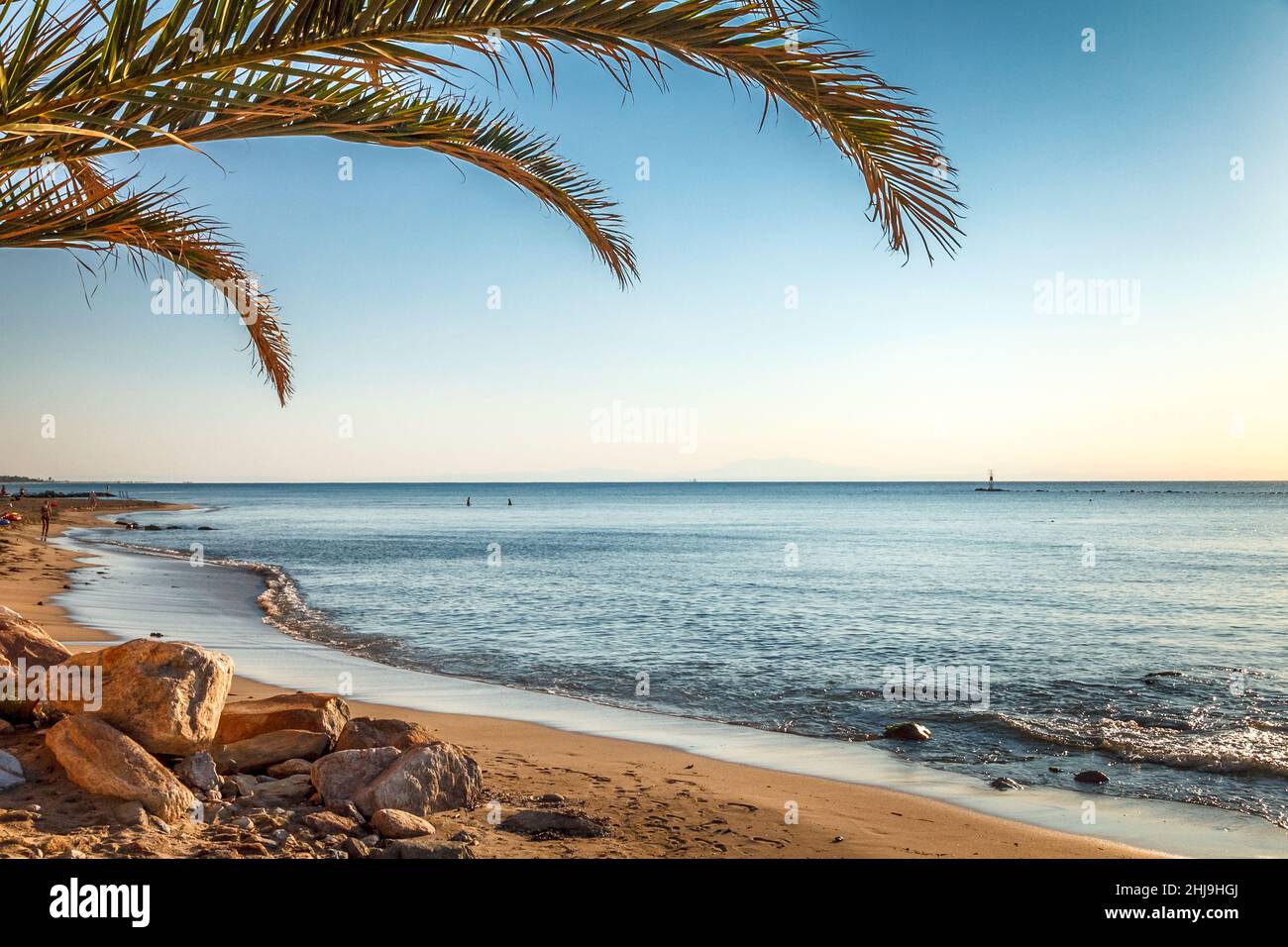 Sea view and sandy beach in The Paralia, a tourist seaside part of the municipality Katerini, Greece, Europe. Stock Photo