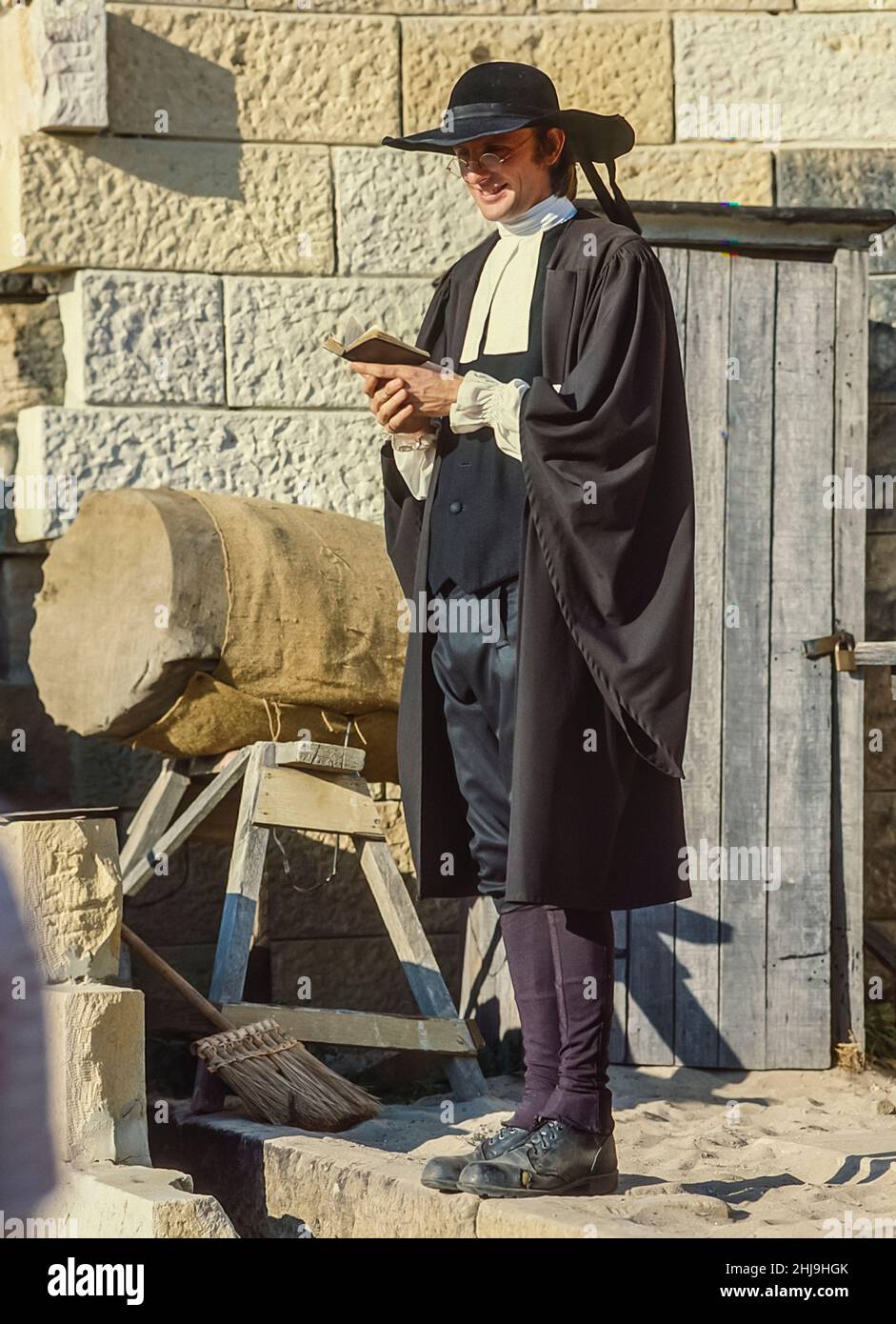 The image is of the replica theme park  of Old Sydney Town as it was in the 17th century being a popular tourist attraction, with this image showing what would have been the local Vicar Stock Photo