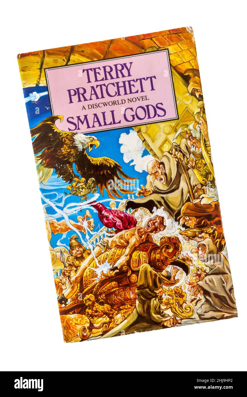 A paperback copy of Small Gods by Terry Pratchett.  It was the 13th novel in the Discworld series and published in 1992. Stock Photo