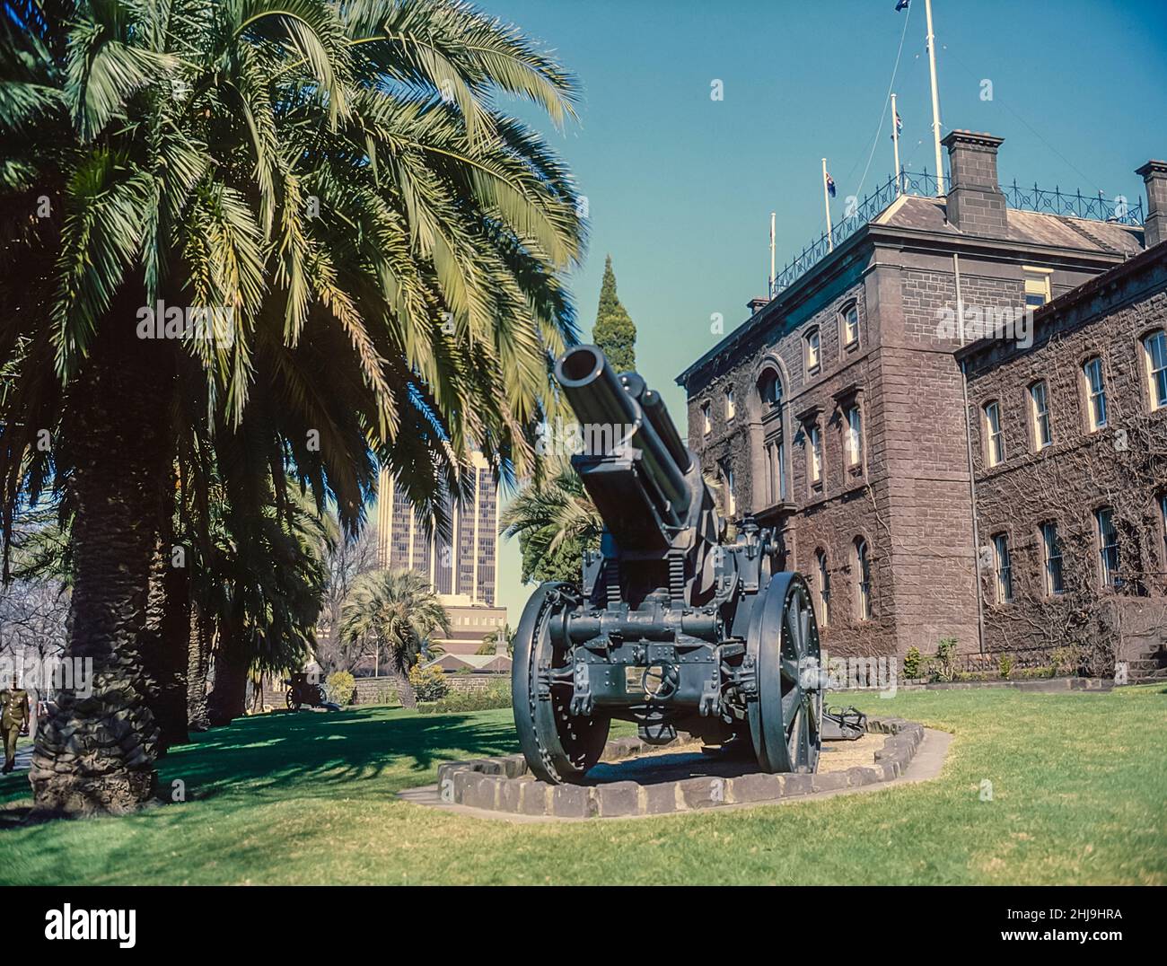 The image is of the impressive Fortress like Melbourne Victoria Barracks Museum close to the Yarra River. With a 5.9 inch Turkish Howitzer captured during the Gaza-Beersheba Campaign near Jerusalem in 1917. The Barracks opened in 1872 Stock Photo