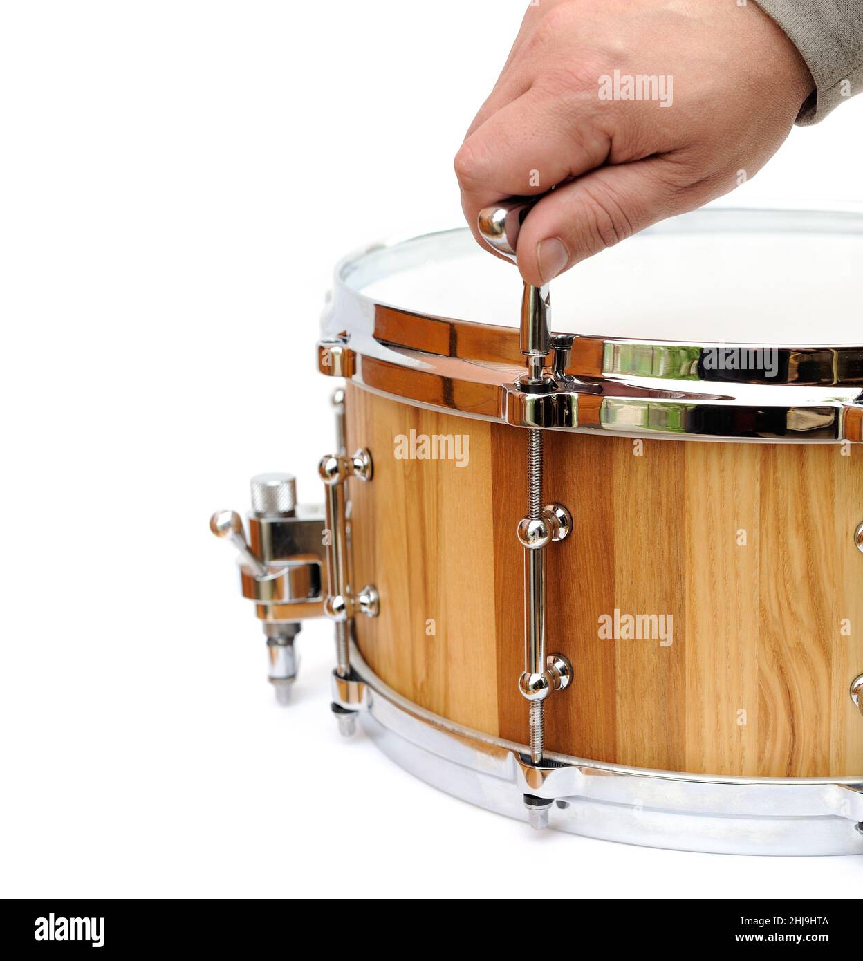 Master tuning new wooden snare drum isolated closeup Stock Photo Alamy