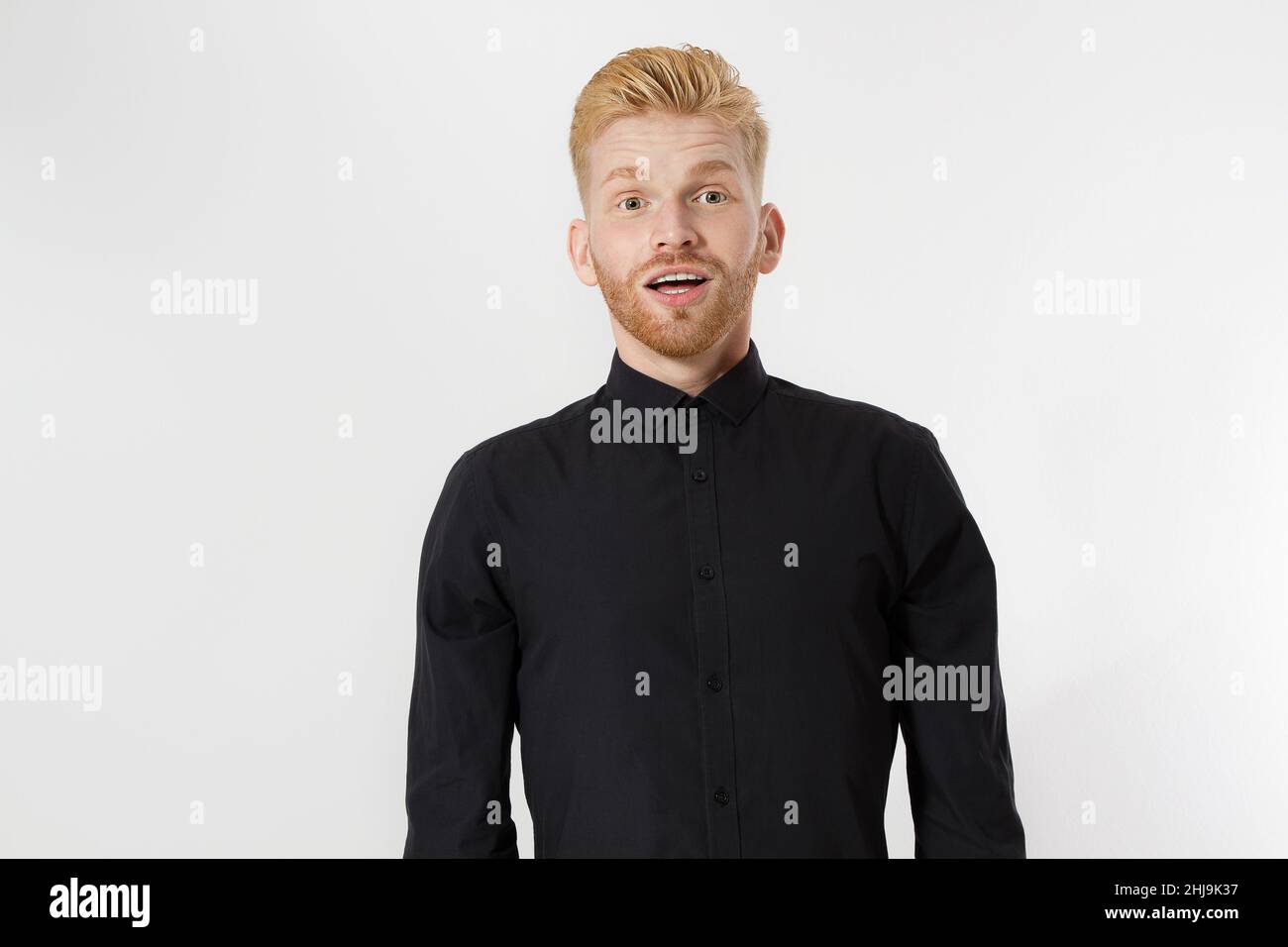 Excited redhead man shouting hi-res stock photography and images - Alamy
