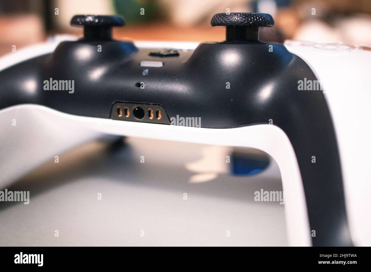 Playstation 5 DualSense Controller on top of Macbook Pro 16 in 2019 Stock  Photo - Alamy
