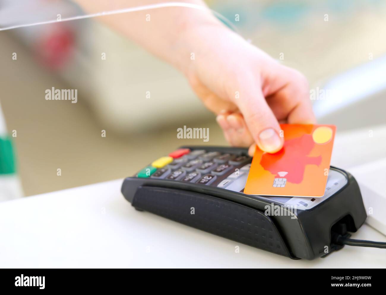 customer pay hold credit card with contactless nfc technology concept